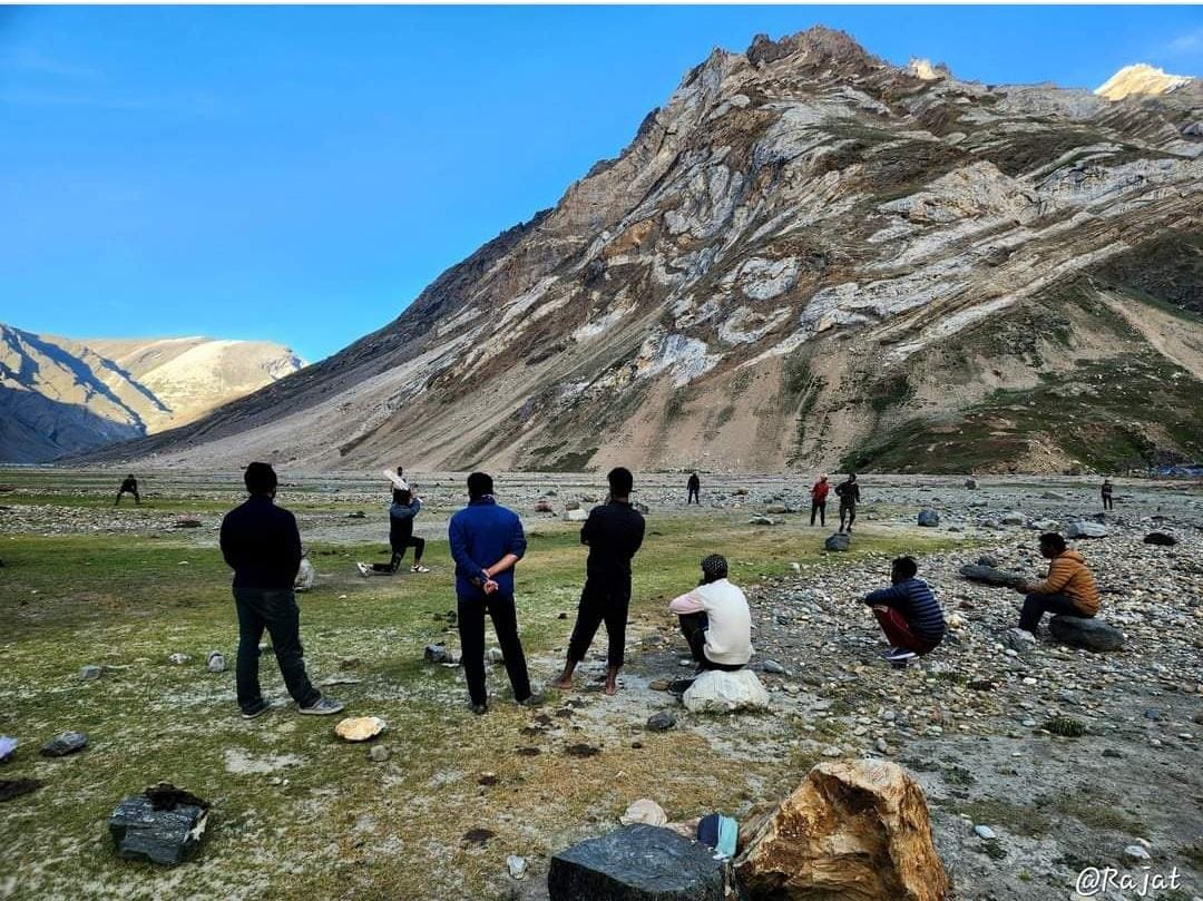 trekkers playing in the campsite of warwan valley trek