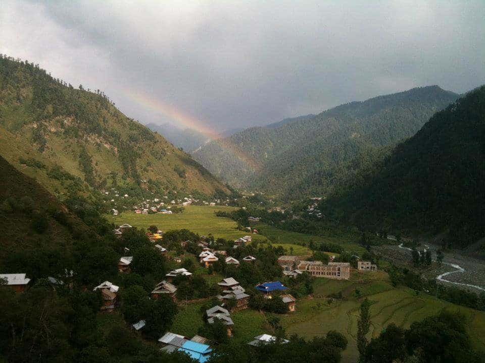 Sinthan Top with a view of rainbow between two mountains