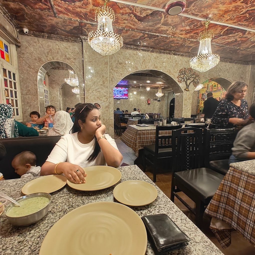 Mughal Darbar – elegant decor, warm ambiance, and rich Mughlai flavors in srinagar