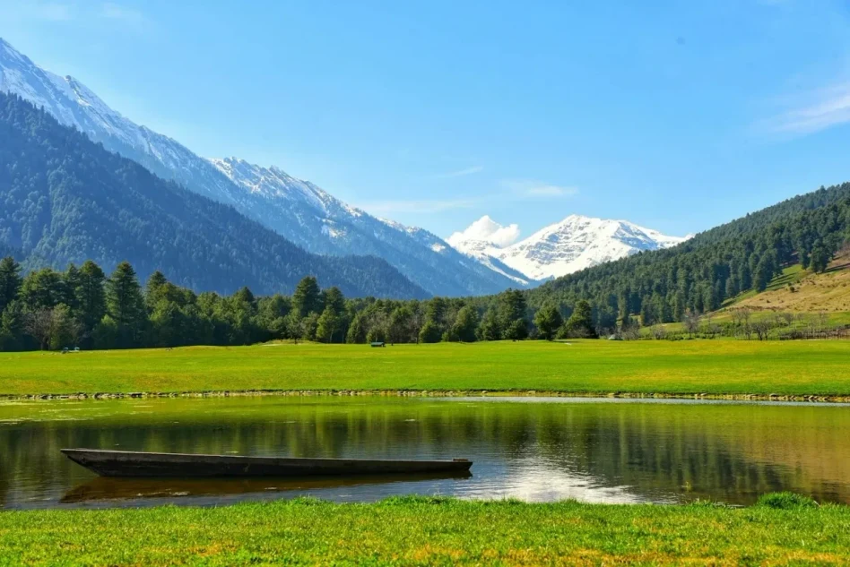 Mini-Switzerland view in Pahalgam with snow-capped mountains and meadow